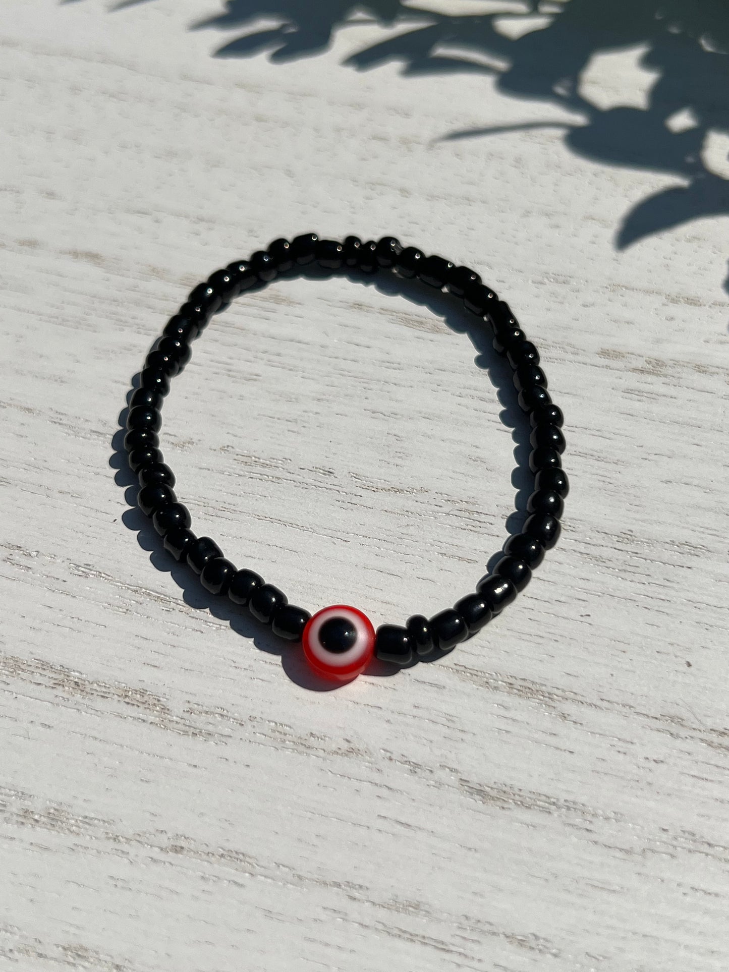 Black Bead Red OJO