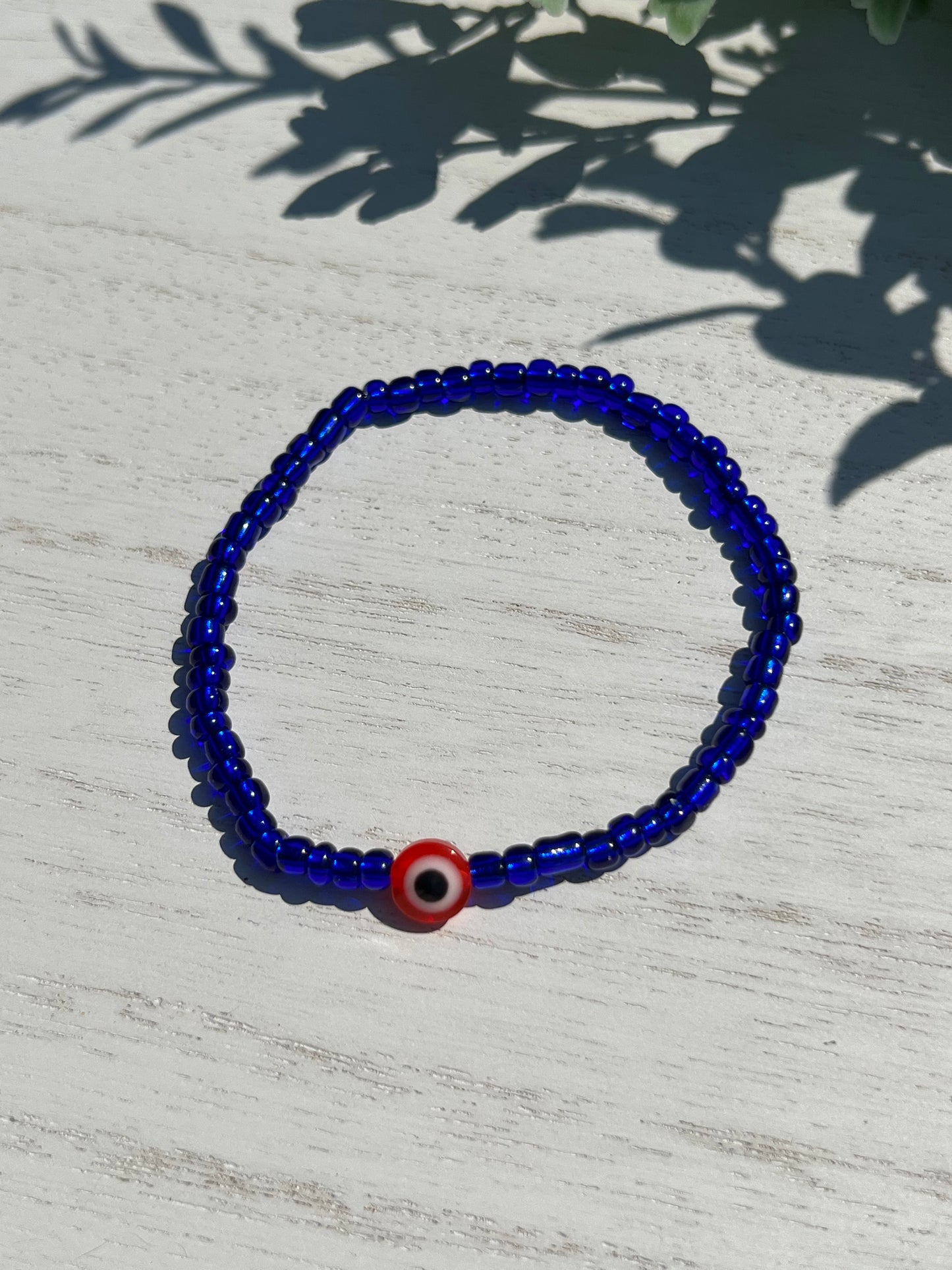 Blue Bead Red OJO