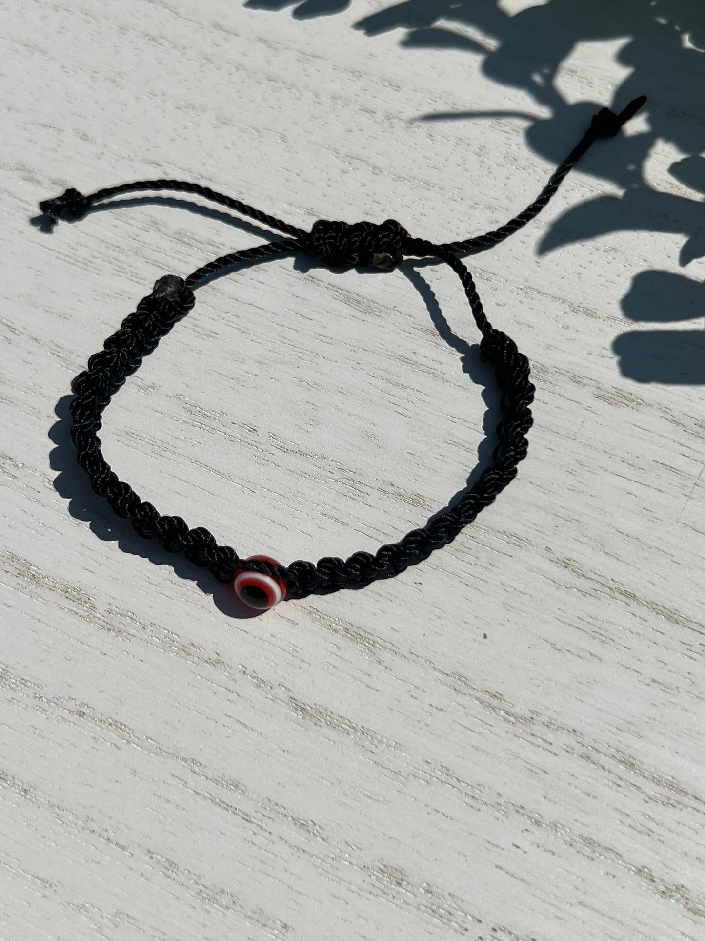 Black Thread Red OJO