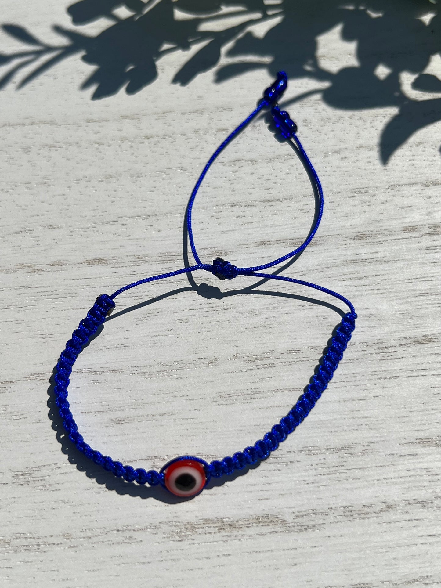 Blue Thread Red OJO