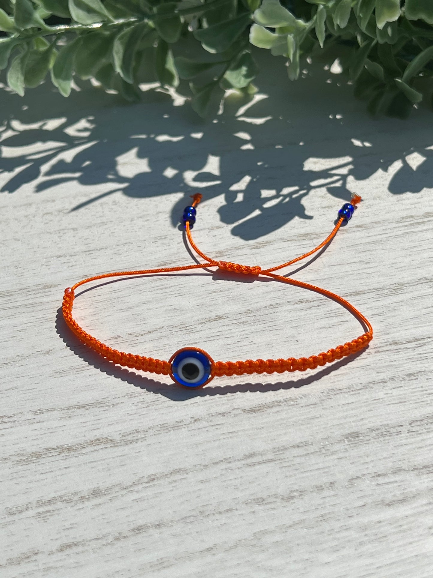 Orange Thread Blue OJO