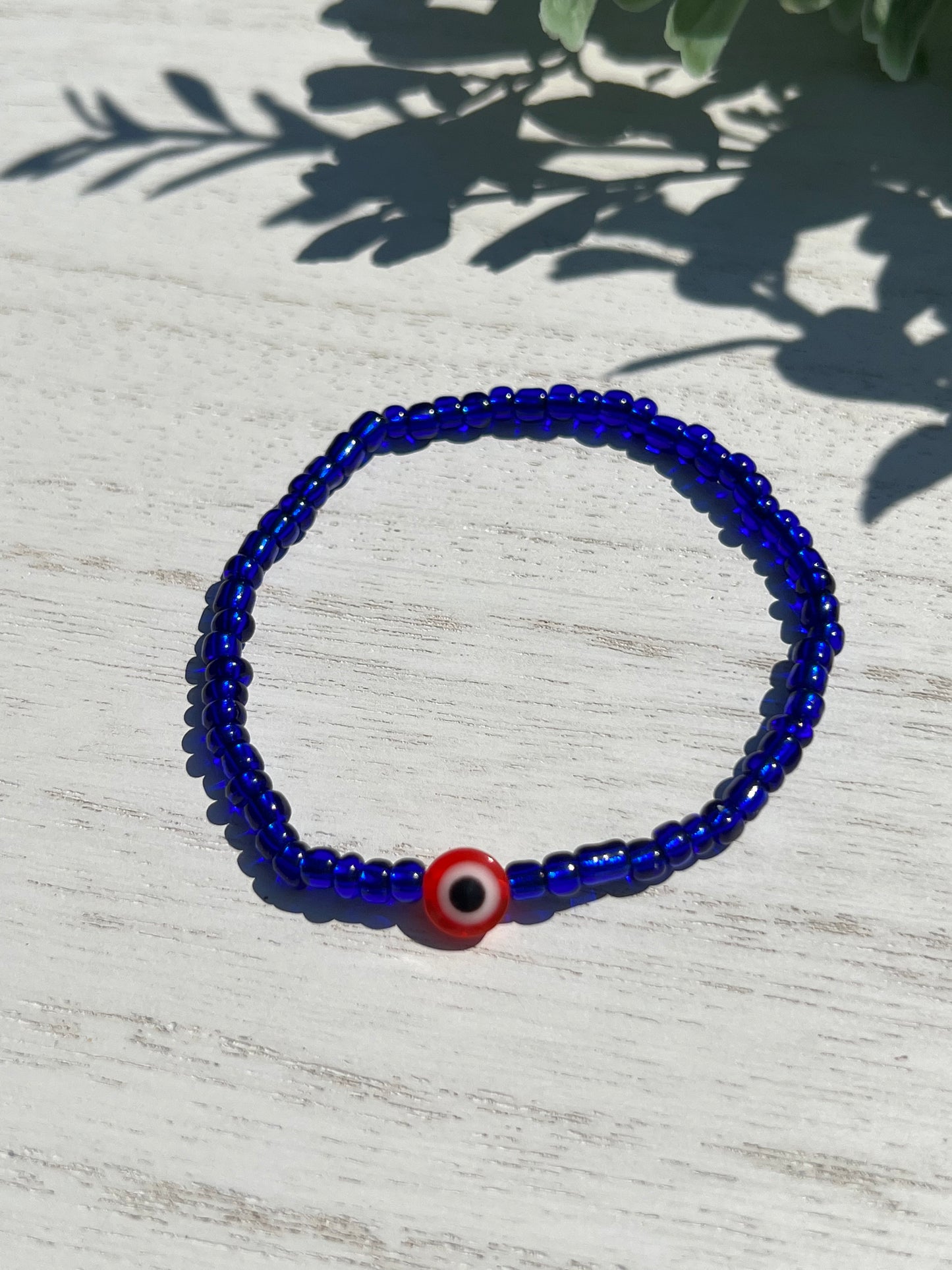 Blue Bead Red OJO